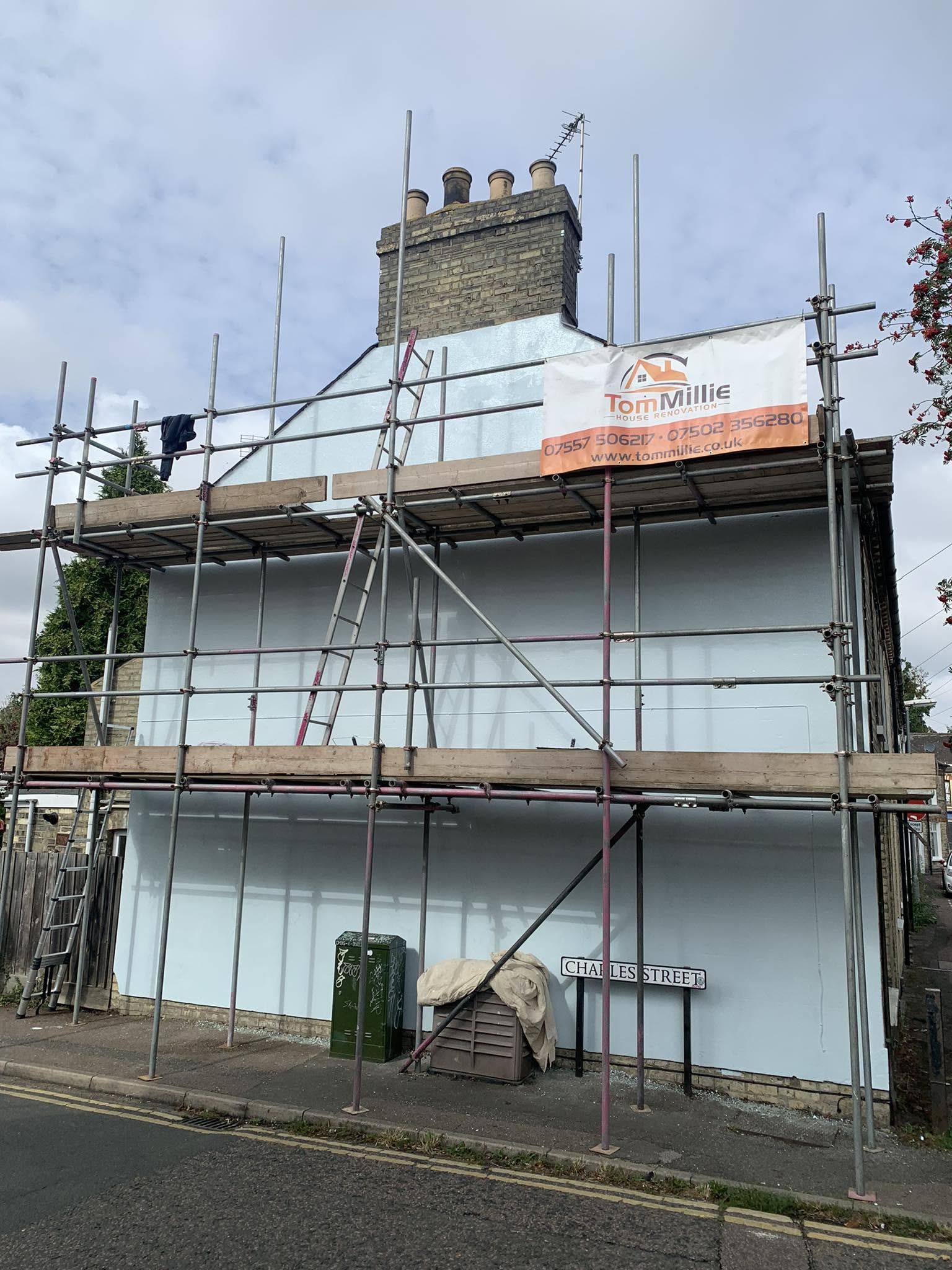 Tom Millie House Renovation exterior render project under scaffolding in Cambridge